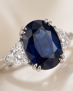 4.87 Carat Oval Sapphire & Trillion Diamond Three-Stone Ring in 18K