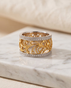 Two-tone 18K gold openwork scroll band with diamond pavé rails