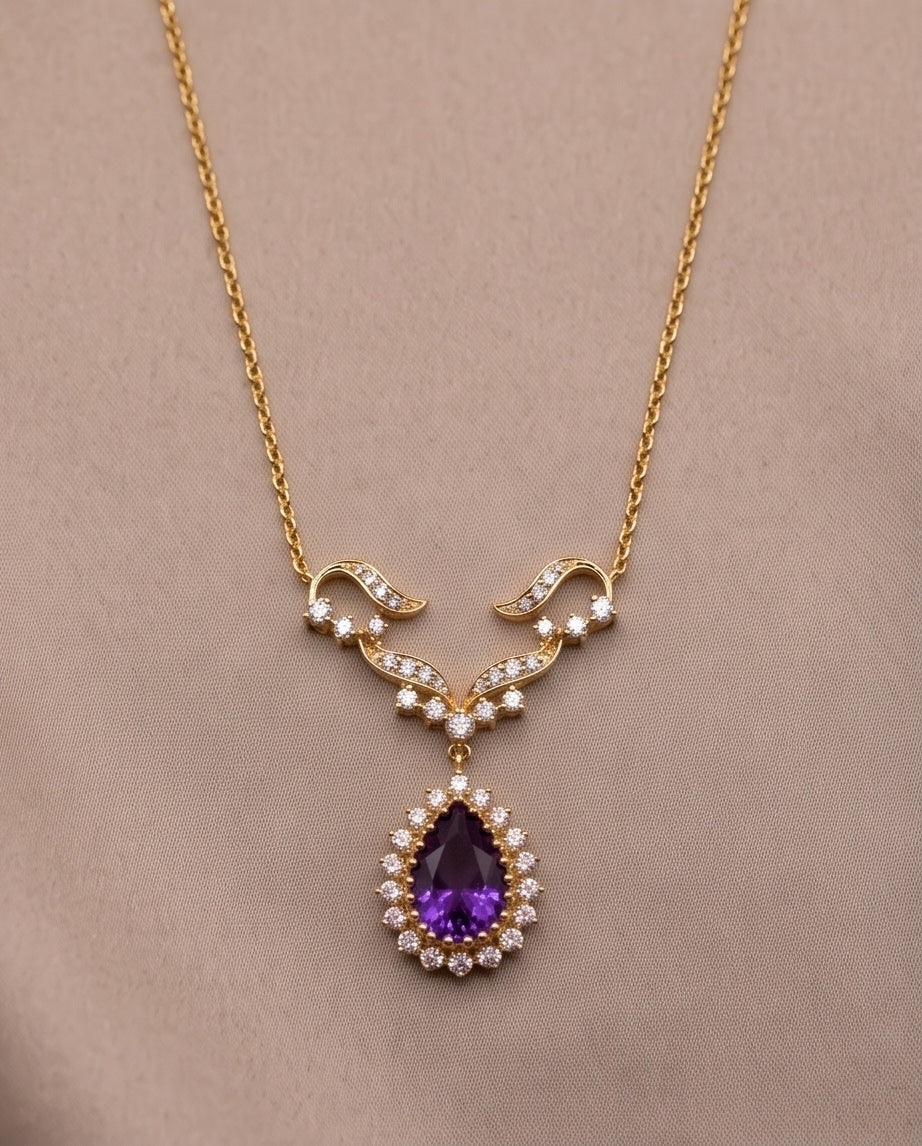 14K gold ornate diamond and teardrop amethyst halo necklace, front view