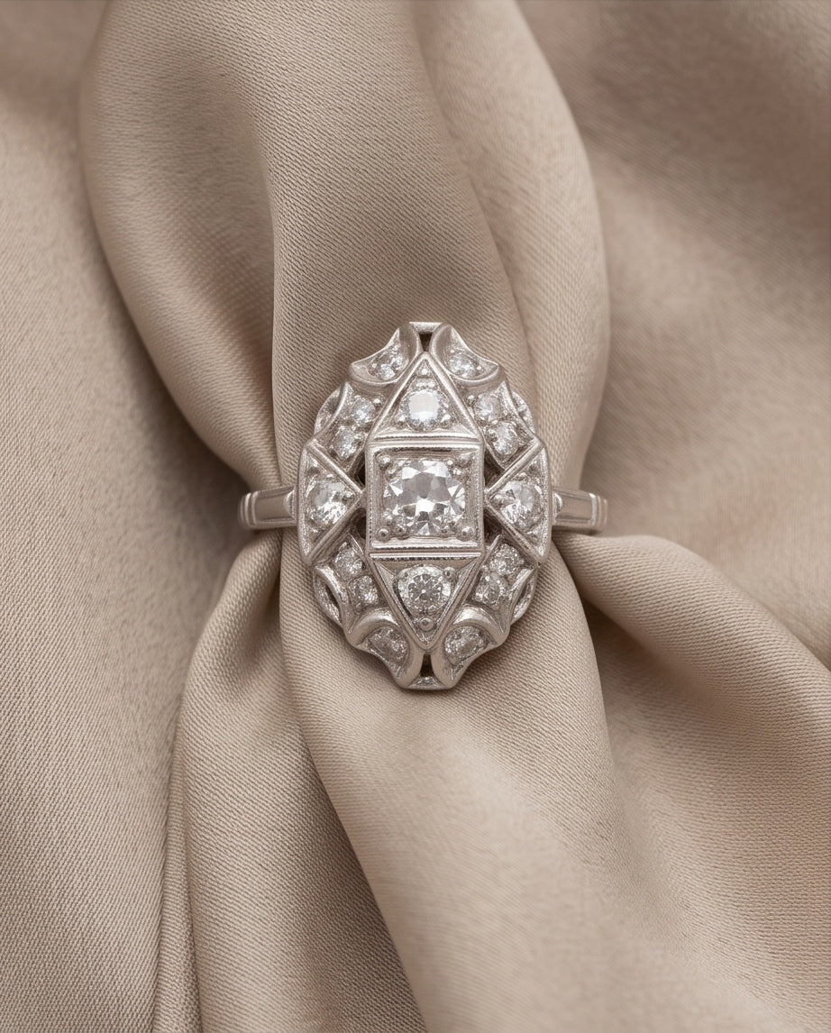 Platinum diamond ring on silk