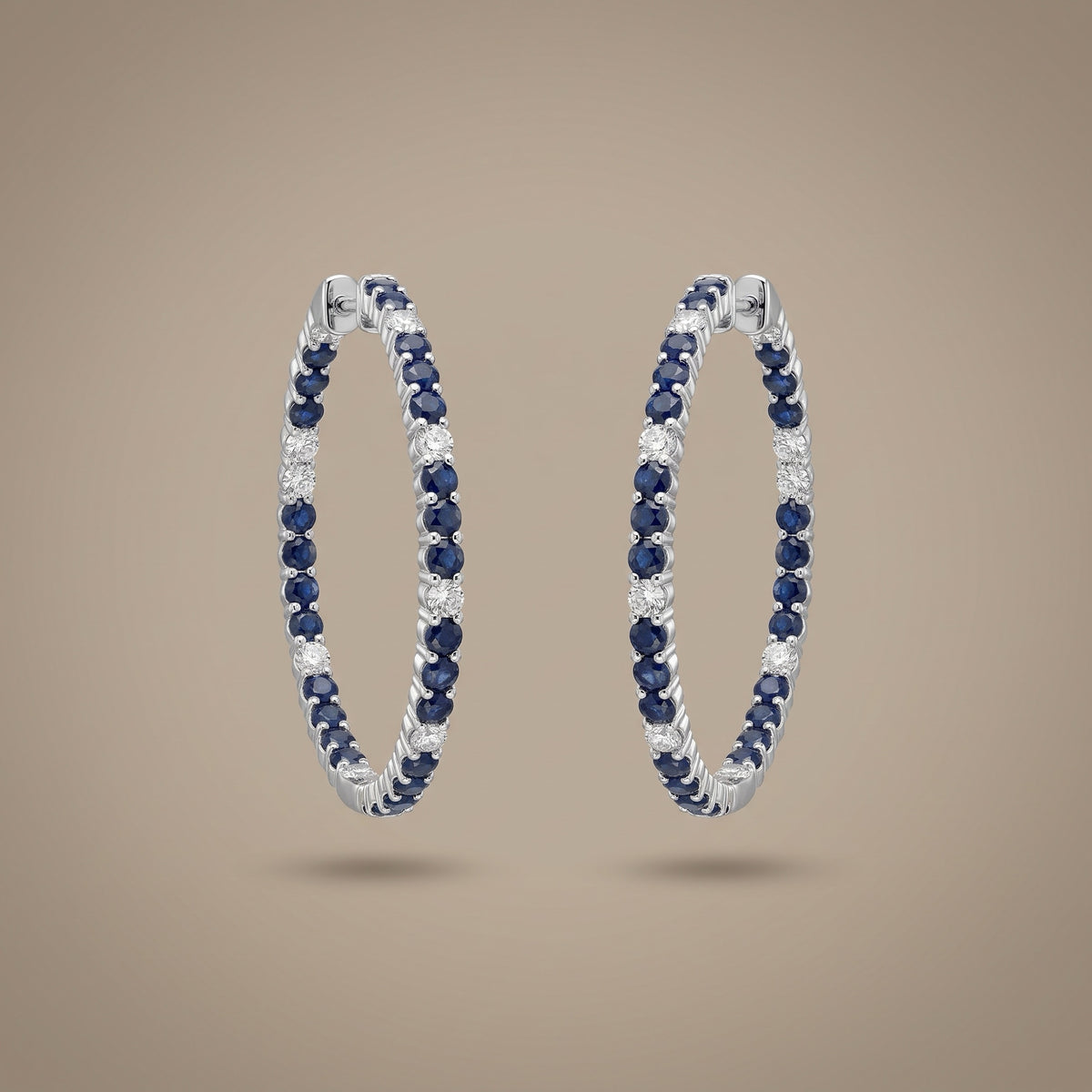18K white gold sapphire and diamond inside-out hoop earrings, pair view