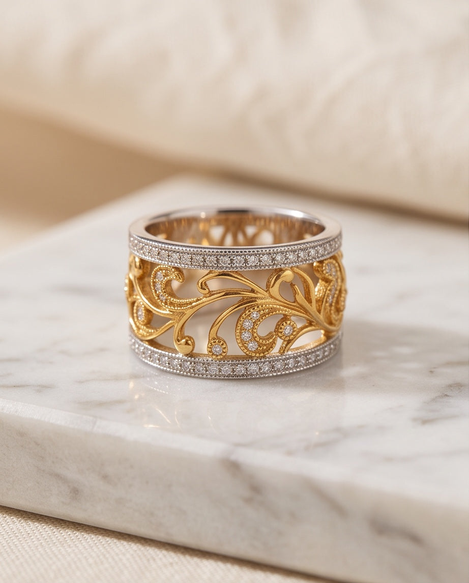 Two-tone 18K gold openwork scroll band with diamond pavé rails