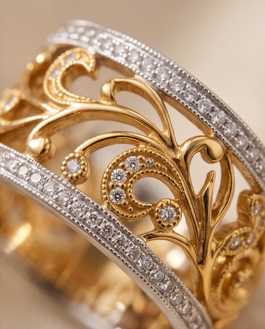 Macro detail of milgrain scrollwork and bezel-set diamonds