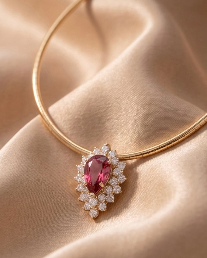 Pink tourmaline and diamond pendant on champagne satin