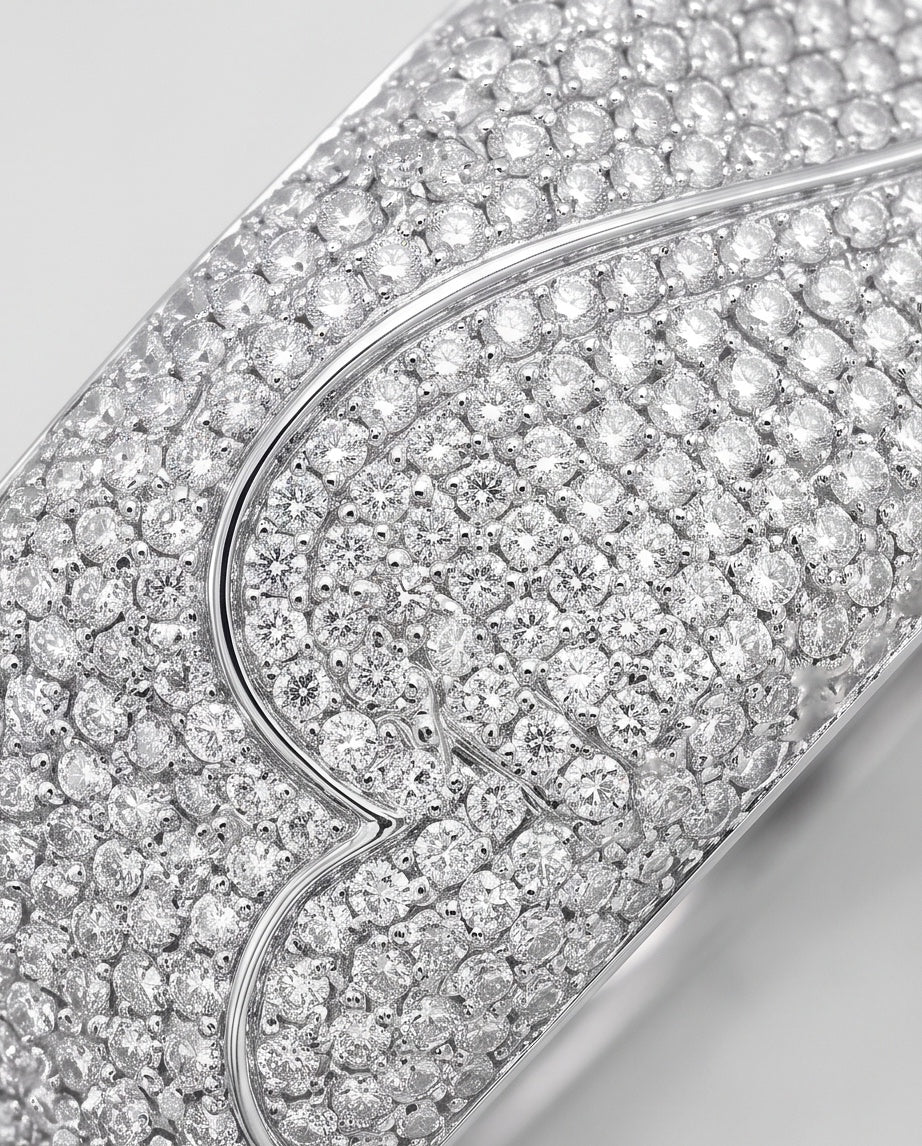 Close-up of pavé diamonds and polished white gold heart line