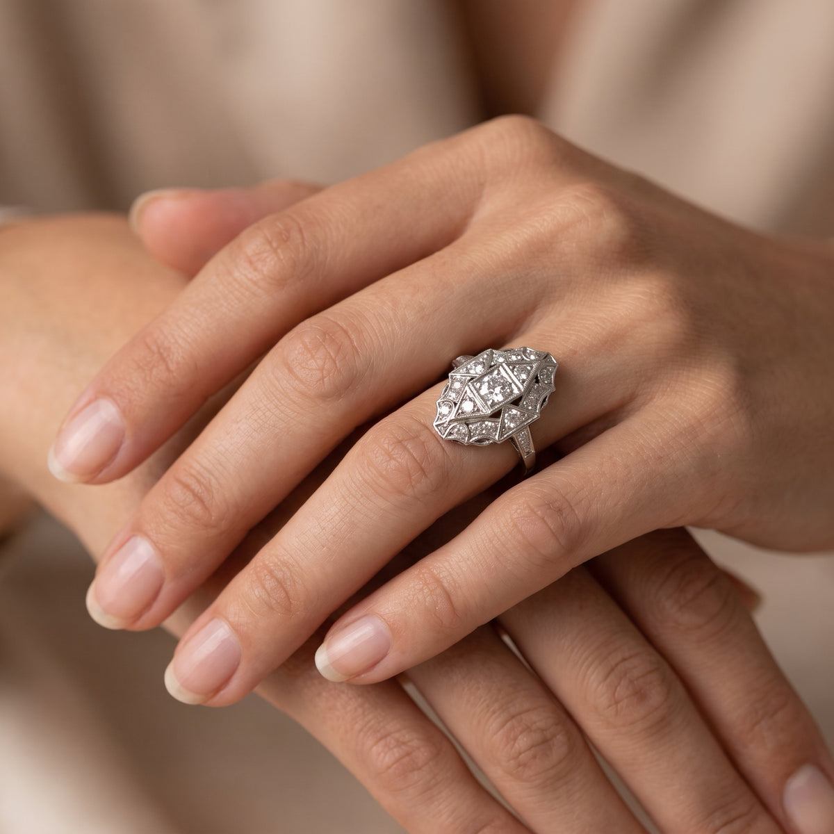 Art Deco style diamond ring worn on hand