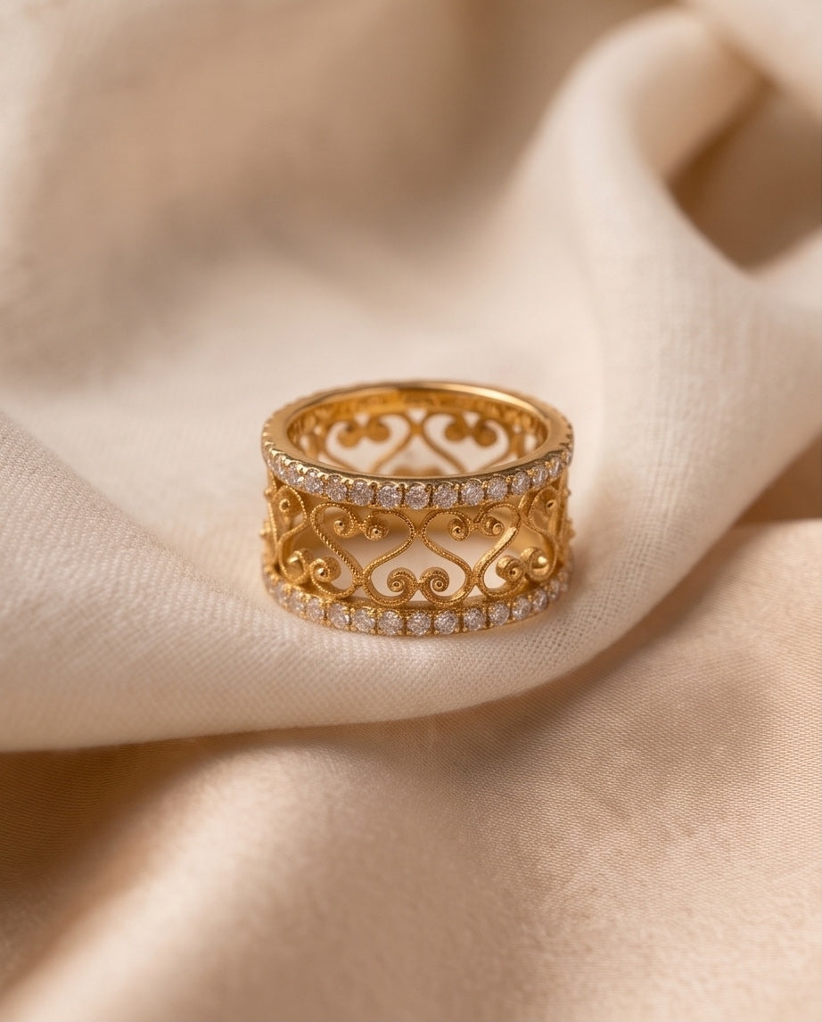 Aegean ornate filigree diamond band ring styled on silk fabric