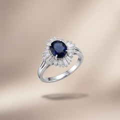 Platinum blue sapphire ballerina diamond ring, studio angled view