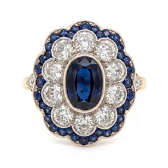Antique sapphire and old-cut diamond cluster ring, studio shot on white
