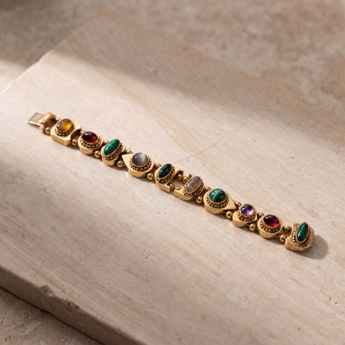 Antique 14K yellow gold multi-gem slide bracelet with citrine, garnet, malachite, agate, jadeite and amethyst cabochons